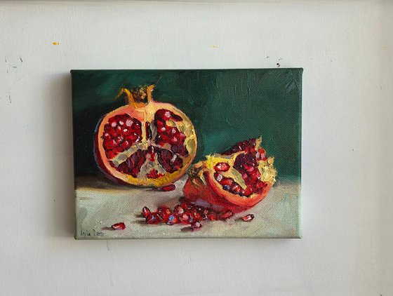 Pomegranate on blue