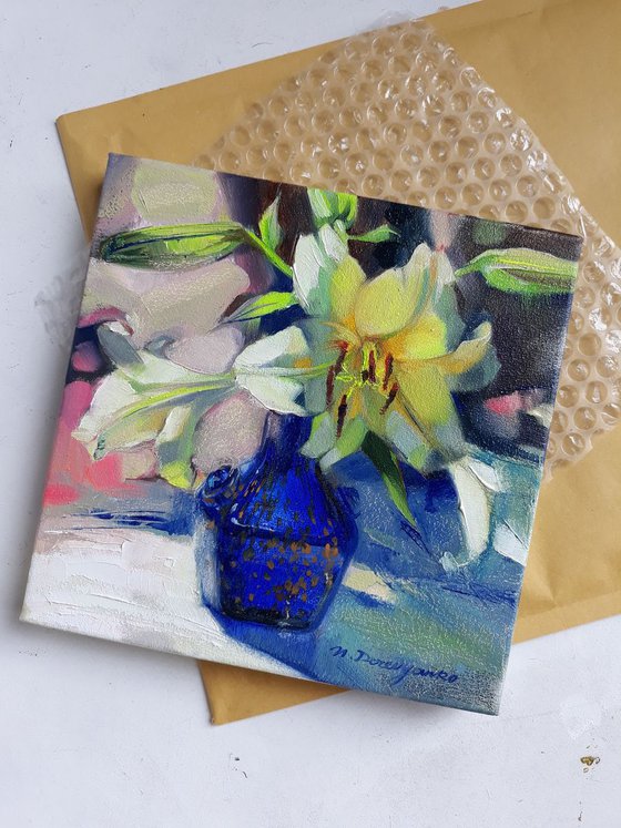 Lily in a blue vase