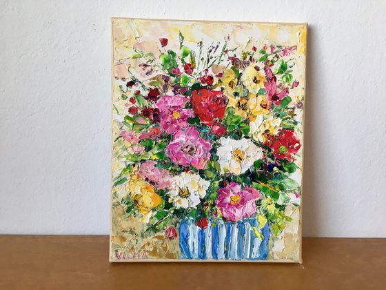 Striped vase with flowers