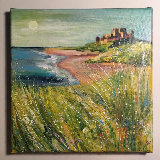 Bamburgh castle in blues and greens