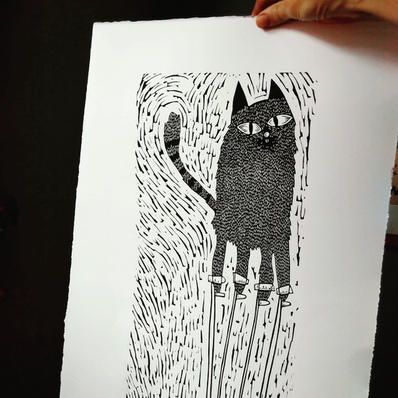 Big cat on stilts - lino