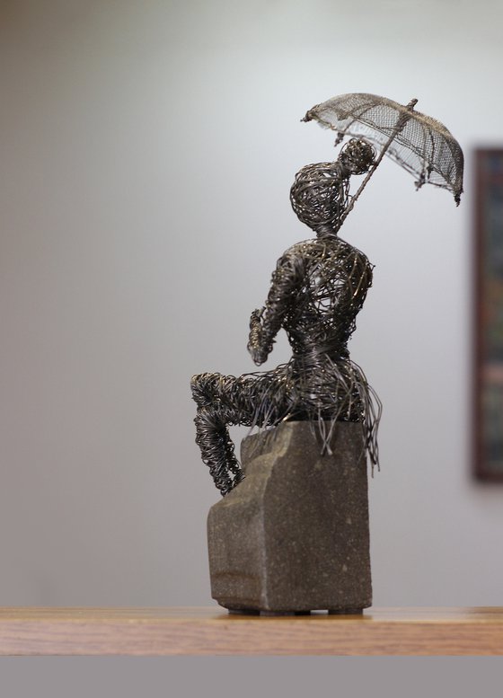 The girl with the umbrella (29x12x12 1.7kg Iron, basalt)
