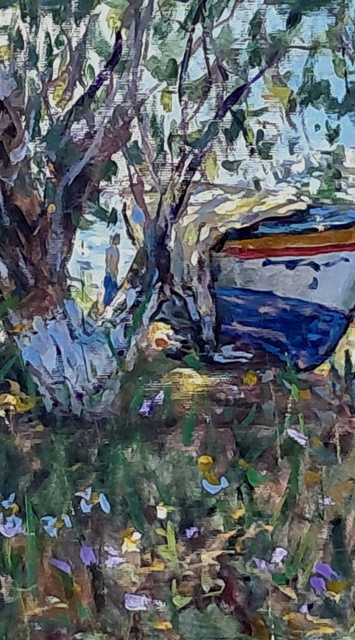 Boats under the tree by Dimitris Voyiazoglou
