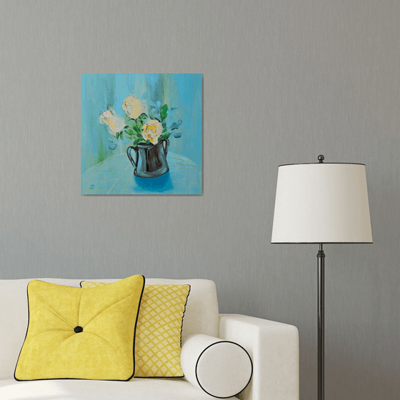 Blooming yellow roses on blue