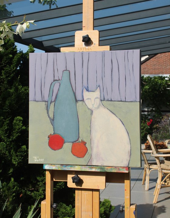 Still life and a white cat.