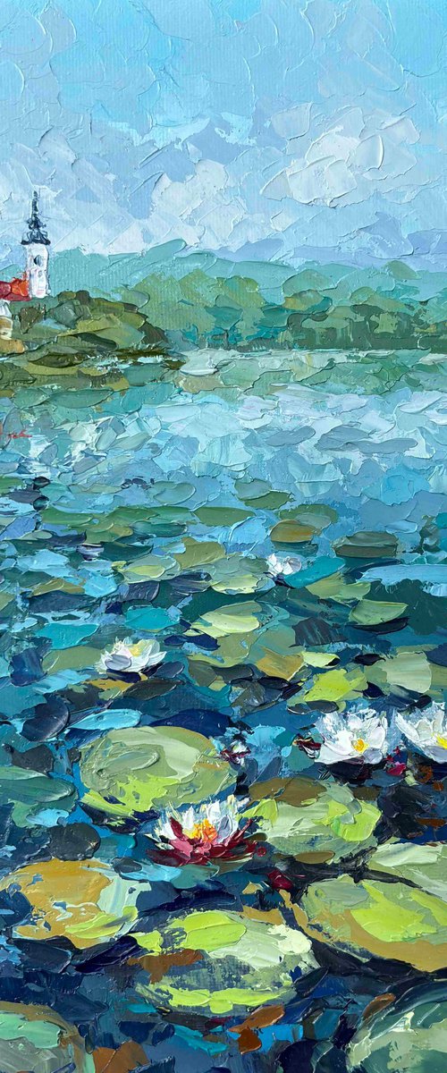 "Water lilies on Lake Bled" by OXYPOINT