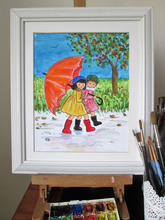 Little girls and an umbrella