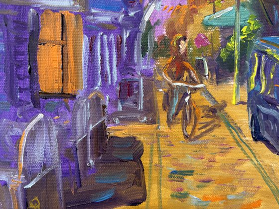 Festive Dutch town scene with cyclist
