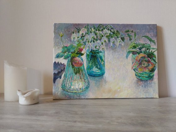 Flowers in blue glass