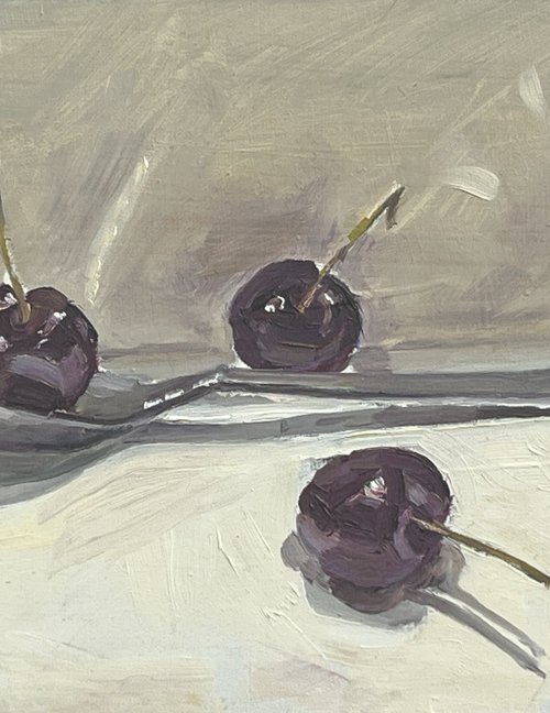 Cherries on a spoon by Louise Gillard