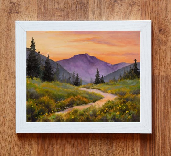 Mountain stream with warm sunset