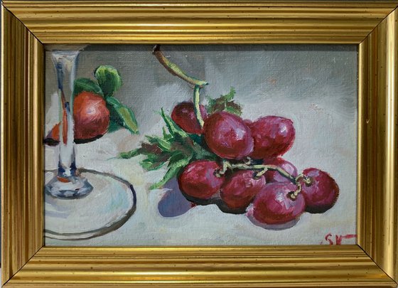 Grapes and glass of wine.