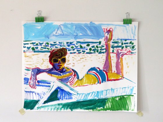 The beach with woman sunbathing