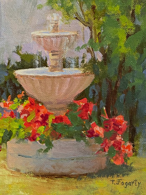 Fountain And Red Flowers