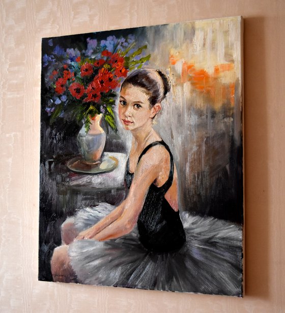 A small ballerina with red poppies