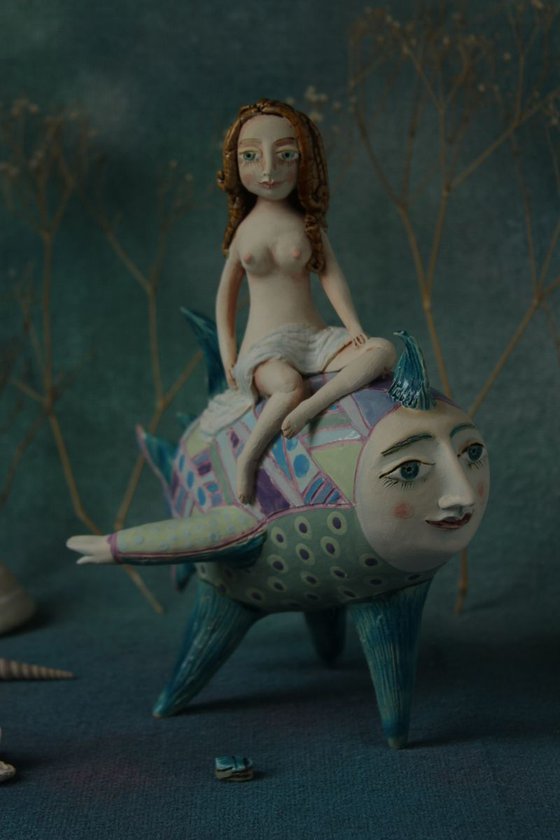 Girl riding the moon fish. Sculpture by Elya Yalonetski, 2018