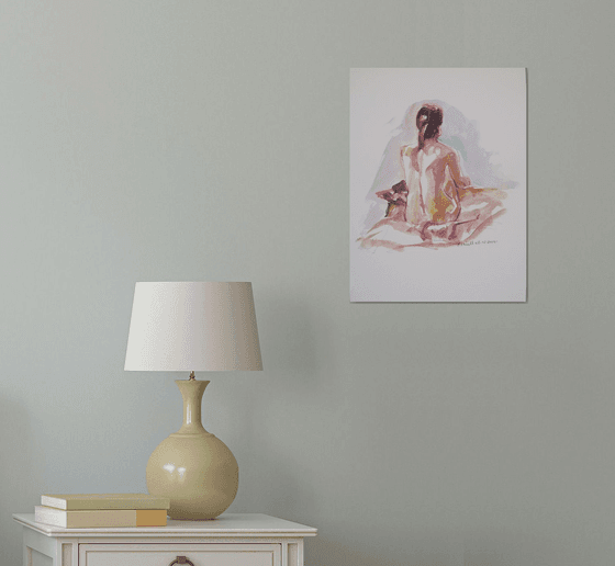 Seated female nude back view