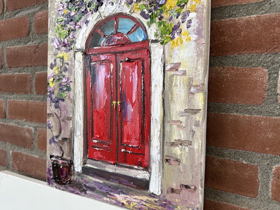 Red door with flowers