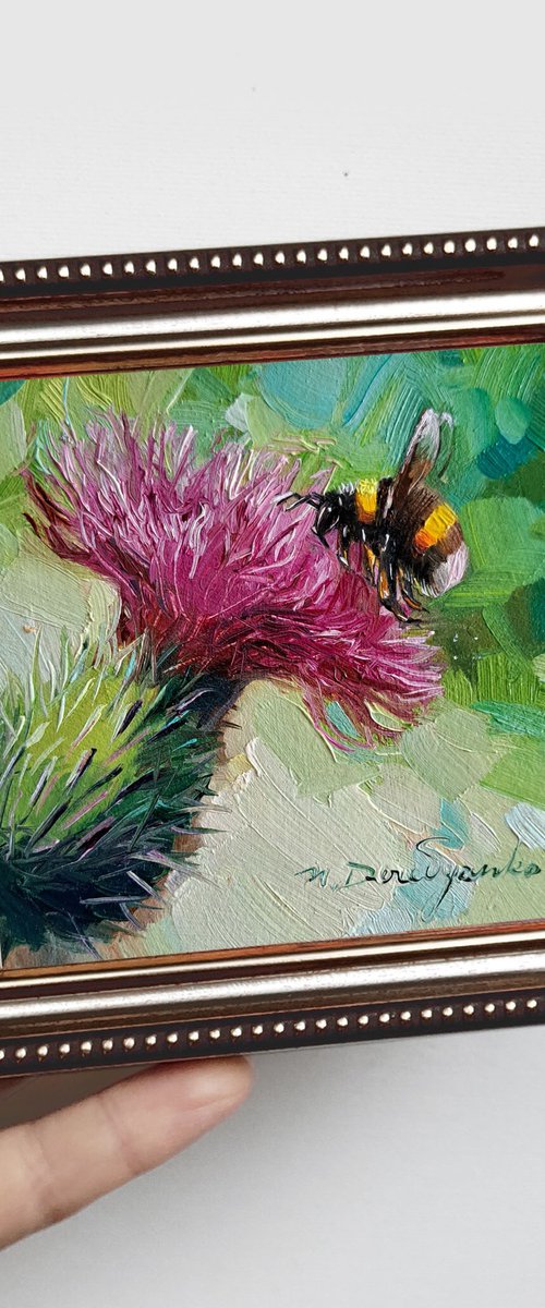 Bumblebee on thistle by Nataly Derevyanko