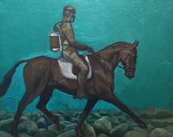 diver underwater with horse
