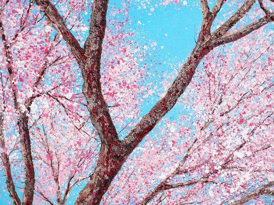 CHERRY BLOSSOM DANCES IN THE BLUE SKY