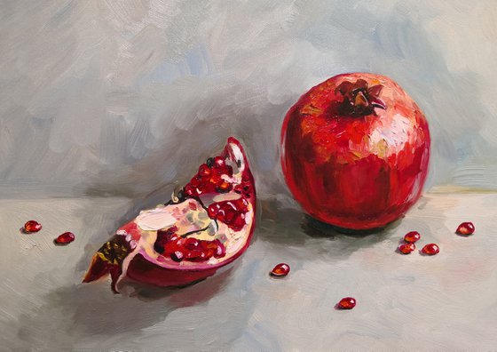 Ripe pomegranate with seeds still life 2