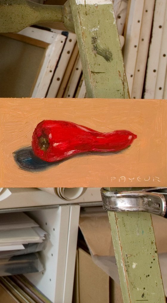 red pepper on ocher background