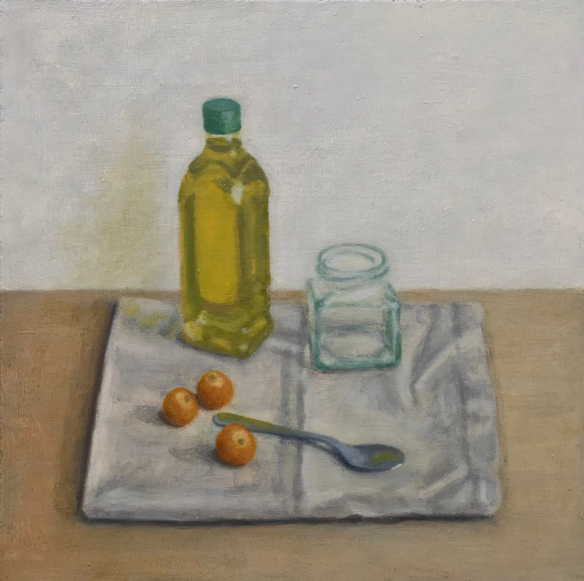 Olive oil bottle with cherry tomatoes by Hugo Lines