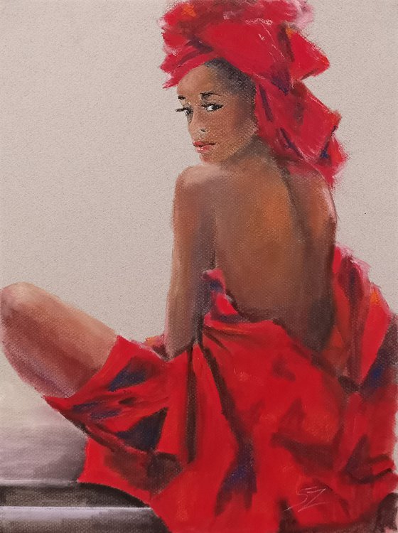 African woman in a red dress