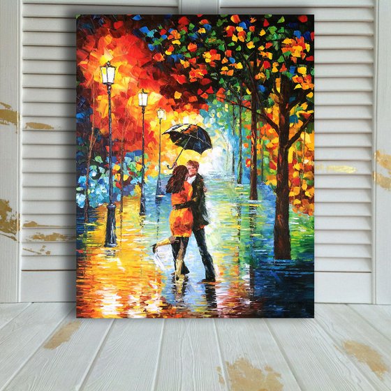 LOVE IN THE RAIN - Couple love. Umbrella. Autumn date. Autumn walk. Kiss. Love. Passion. Meeting. Parting.