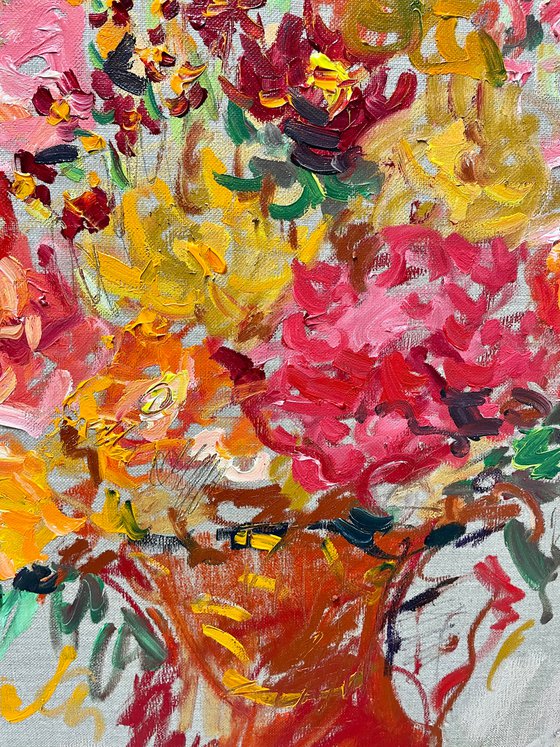 Summer flowers in a red jug