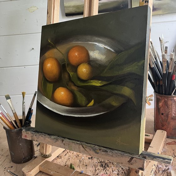 Citrus on a pewter plate