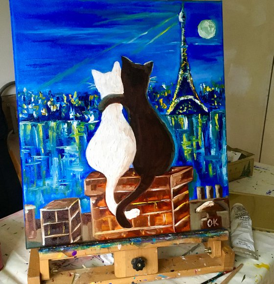 Cats in Paris. Travel to Paris, Parisian roofs , romantic night .