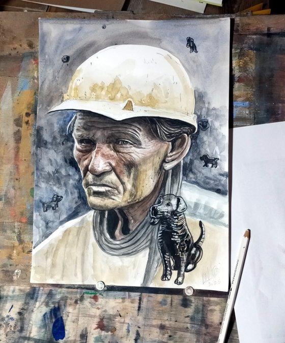 Old miner with dogs