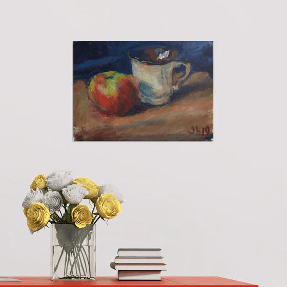 Apple and a cup