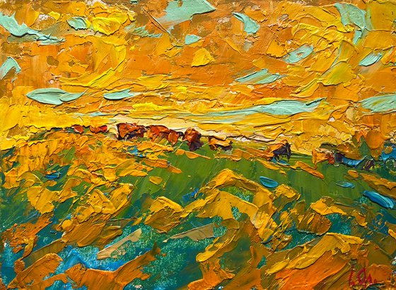 Yellow sunset in the field