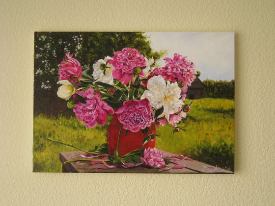 Peonies in red vase