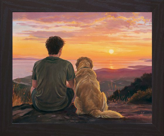 Boy sitting with a Golden Retriever dog