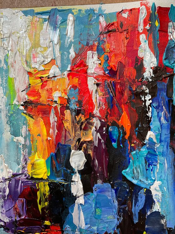 Bright umbrellas. Lady in pink