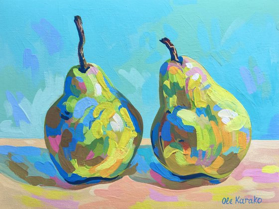 Two pears on a blue background