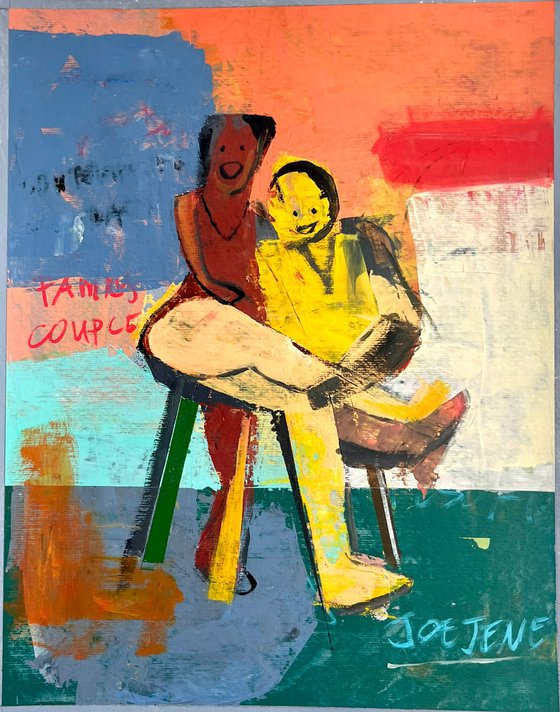 Happy Couple Sitting On A Chair