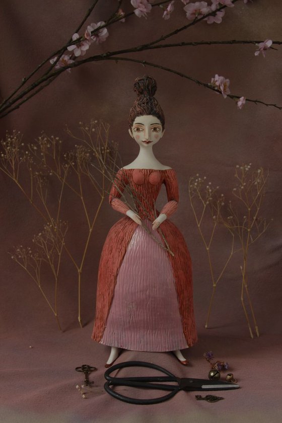 Beautiful Dame with Twirled Updo in Red & White Dress.  Wall sculpture by Elya Yalonetski