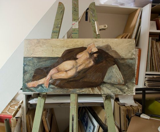 nude woman reading