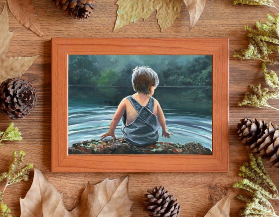 Child in twilight lake scene