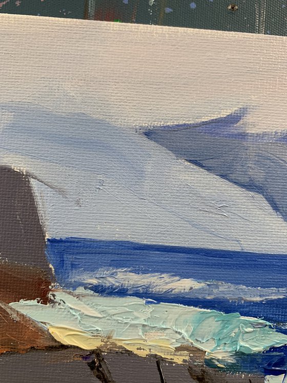 Sea rocks and beach.
