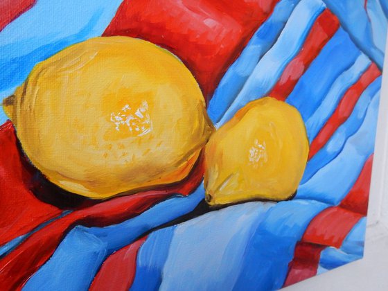 Lemons on the tablecloth. Still life. 30x40cm