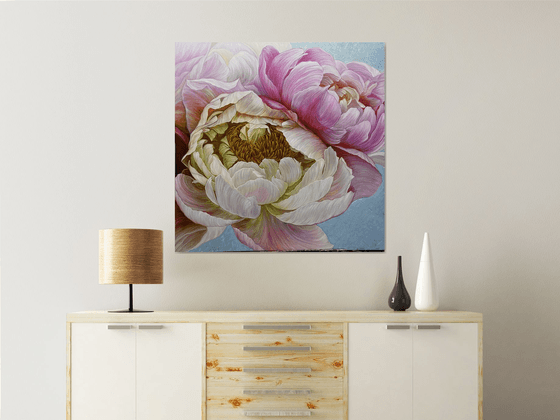 A pair of peonies in a delicate color