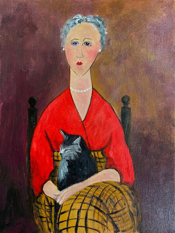 Grey haired woman with Tabby Cat