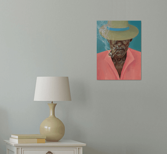 Smoking man in a hat