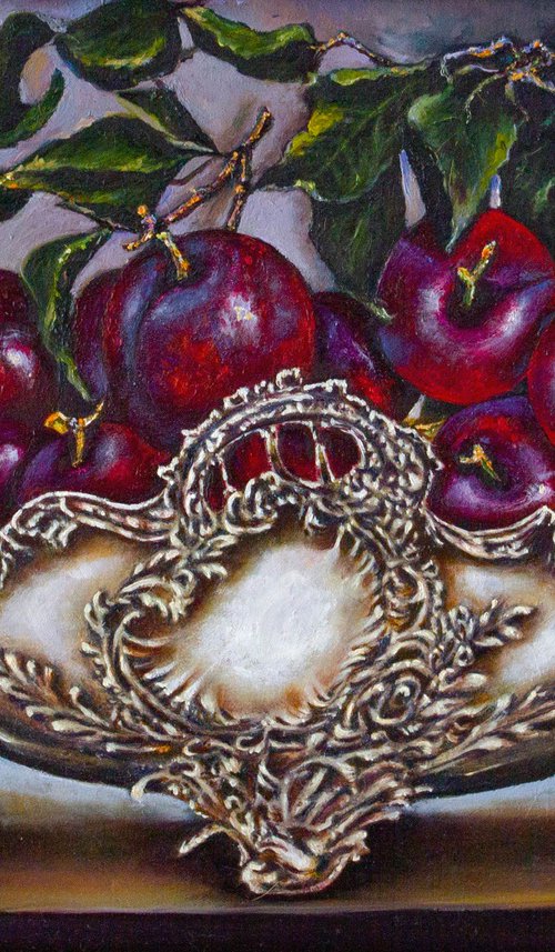 Plums in an antique fruit bowl by Inga Loginova